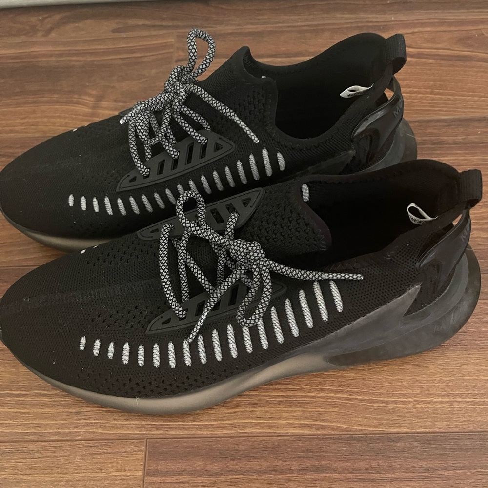 Never worn men athletic knit sneaker. Size 9.5